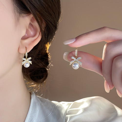 蝴蝶結珍珠吊墜耳環2026新款爆款高級感輕奢耳墜女氣質耳釘耳飾品 蝴蝶結珍珠吊墜耳環2026新款爆款高級感輕奢耳墜女氣質耳釘耳飾品