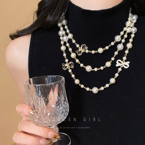 小香風蝴蝶結珍珠項鍊女輕奢高級感長款毛衣鏈千金風氣質頸鏈配飾
