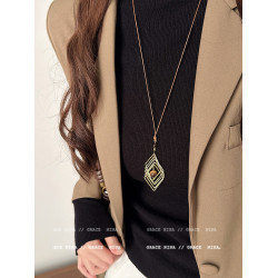 復古輕奢美拉德金屬線纏繞虎眼石吊墜項鍊女長款毛衣鏈配飾高級感