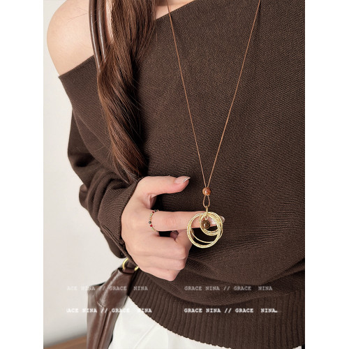 復古輕奢美拉德金屬線纏繞虎眼石吊墜項鍊女長款毛衣鏈配飾高級感