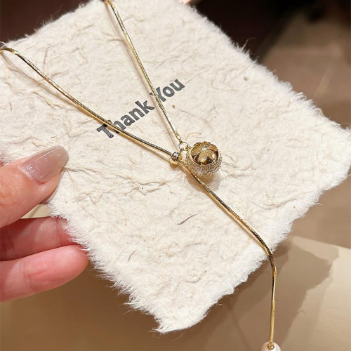 輕奢鑽球吊墜毛衣鏈極簡抽拉可調節項鍊2026秋冬女長款潮人氣質 輕奢鑽球吊墜毛衣鏈極簡抽拉可調節項鍊2026秋冬女長款潮人氣質