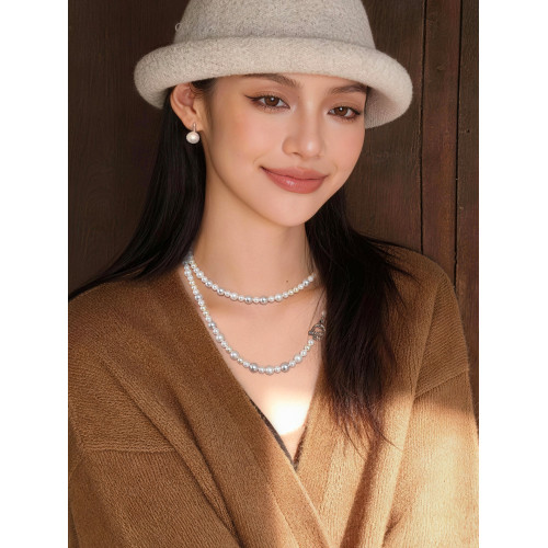 赫本風長款施家華子OT釦珍珠項鍊女2026新款高級感輕奢鎖骨毛衣鏈