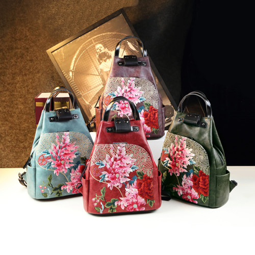 民族風時尚真皮雙肩單肩手拎多用包刺綉花原創設計款女士休閒後後背包