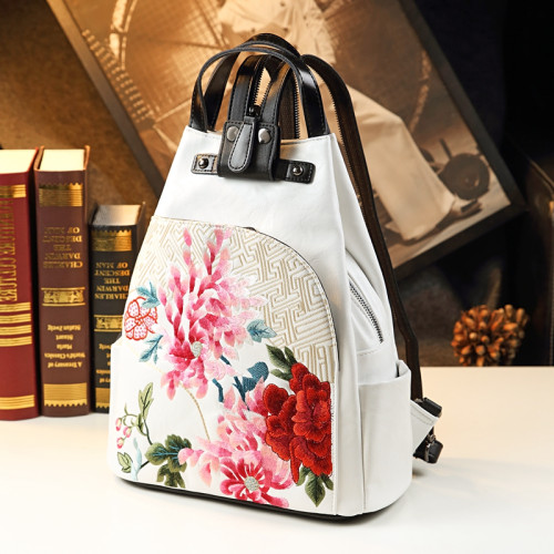 民族風時尚真皮雙肩單肩手拎多用包刺綉花原創設計款女士休閒後後背包