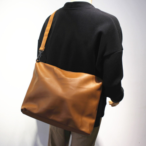 潮新款大容量斜後後背包健身包男士軟皮時尚單肩包簡約潮流男包旅行包