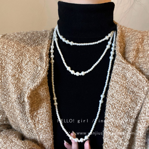 輕奢多層曡戴珍珠項鍊女2026新款爆款鎖骨鍊高級感秋冬長款毛衣鏈 輕奢多層曡戴珍珠項鍊女2026新款爆款鎖骨鍊高級感秋冬長款毛衣鏈