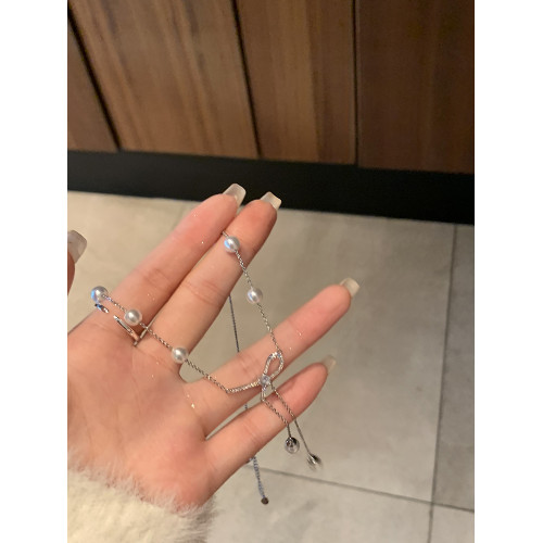 浪漫情書!!蝴蝶結珍珠流蘇項鍊女輕奢小衆頸鏈設計感高級鎖骨鍊 浪漫情書!!蝴蝶結珍珠流蘇項鍊女輕奢小衆頸鏈設計感高級鎖骨鍊