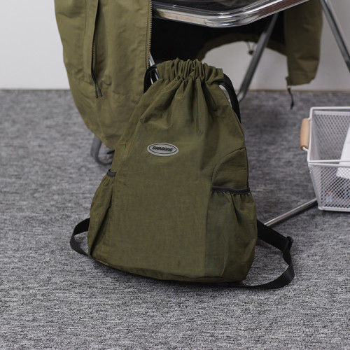 抽繩雙肩包女2024新款束口袋運動輕便雙肩包旅行包男戶外簡約後後背包