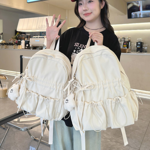 小衆設計褶皺雙肩包女旅遊輕便可愛蝴蝶結書包初中女生大學生後後背包