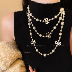 小香風蝴蝶結珍珠雙層項鍊女款高級感輕奢精緻小衆毛衣鏈長款配飾