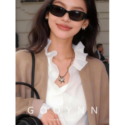 民族風復古編織繩小馬項鍊女款高級感輕奢小衆銀色吊墜鎖骨毛衣鏈