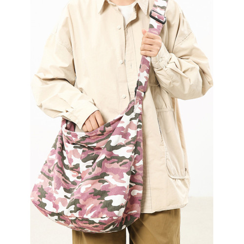 迷彩帆布大包2026新款個性豹紋潮斜後後背包男時尚復古單肩包女托特包