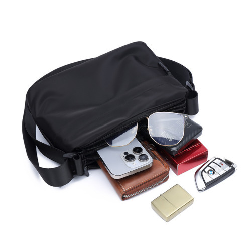 新款斜後後背包包男款挎包簡約百搭男士外出隨身小包可攜式休閒單肩後後背包