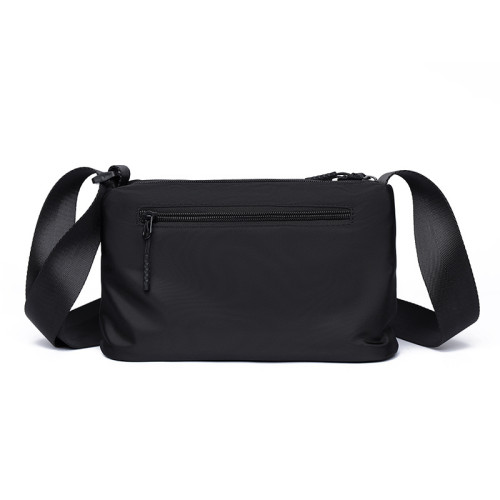 新款斜後後背包包男款挎包簡約百搭男士外出隨身小包可攜式休閒單肩後後背包