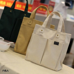 帆布袋男生手提袋男簡約女上班族帆布包大容量結實小衆設計感網紅