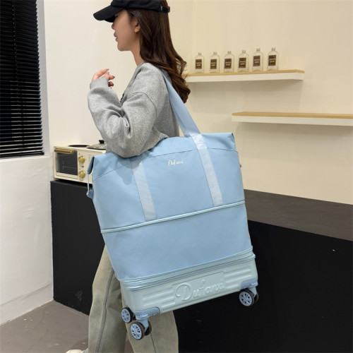 大容量旅行包女手提萬向輪短途行李袋旅行可攜式行李包出差收納袋男