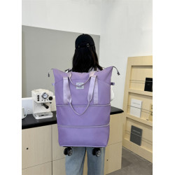 新款大容量帶輪旅行包免托運可登機包可裝被子雙肩背萬向輪旅行包