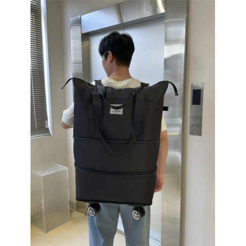 新款大容量帶輪旅行包免托運可登機包可裝被子雙肩背萬向輪旅行包