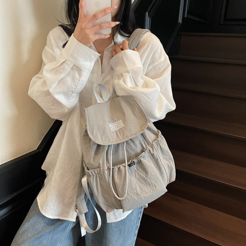 簡約輕便學生雙肩包女2025新款休閒百搭大容量外出後後背包時尚通勤包