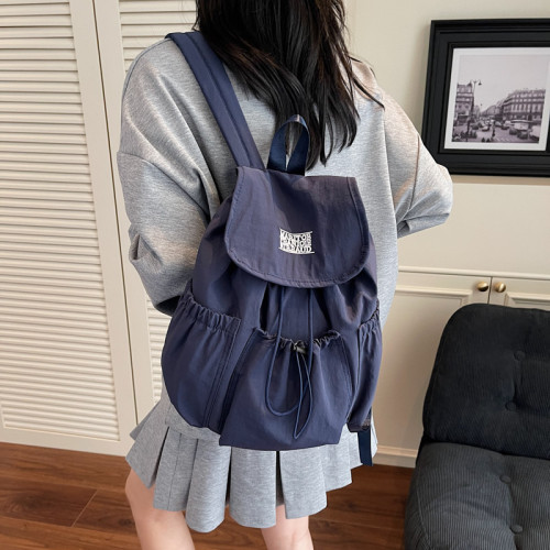 簡約輕便學生雙肩包女2025新款休閒百搭大容量外出後後背包時尚通勤包
