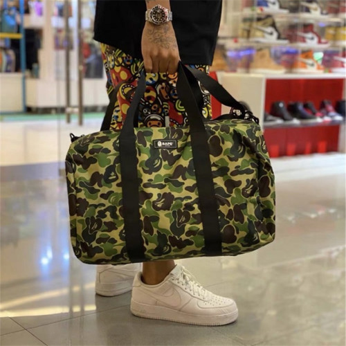 外星伴侶Bape迷彩猿人頭潮流單肩包手提斜後後背包旅行包運動桶包