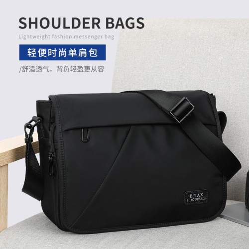 時尚郵差包橫款單肩包男士包包大容量書包斜背後後背包牛津布斜後後背包男