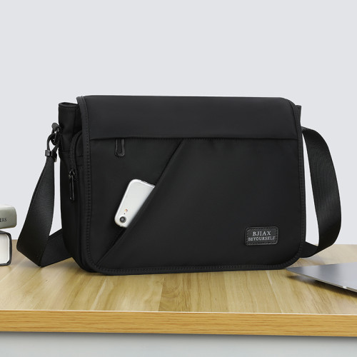 時尚郵差包橫款單肩包男士包包大容量書包斜背後後背包牛津布斜後後背包男