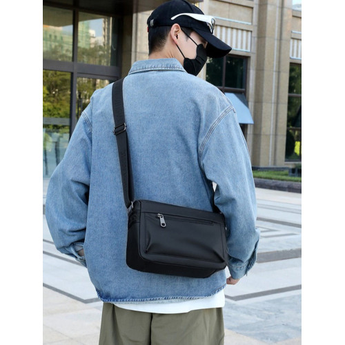 包包男士2025新款郵差包上班雜物通勤斜後後背包小挎包大容量旅行包袋