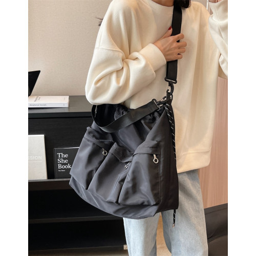 港風潮酷暗黑風單肩包男女百搭抽繩束口大容量尼龍布斜後後背包通勤包