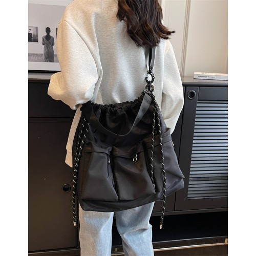 港風潮酷暗黑風單肩包男女百搭抽繩束口大容量尼龍布斜後後背包通勤包