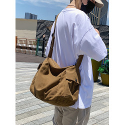 日系復古帆布包男生休閒大容量斜後後背包ins潮牌單肩包女通勤郵差包