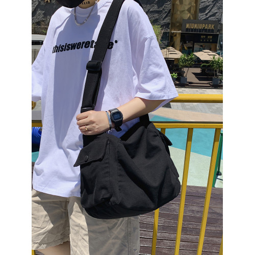 日系復古帆布包男生休閒大容量斜後後背包ins潮牌單肩包女通勤郵差包