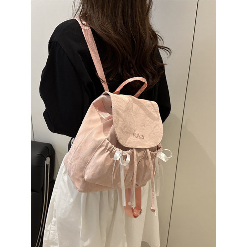 休閒帆布蝴蝶結雙肩包女式包包2025夏季新款小衆後後背包簡約旅行包