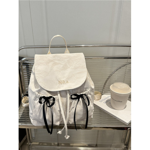 休閒帆布蝴蝶結雙肩包女式包包2025夏季新款小衆後後背包簡約旅行包