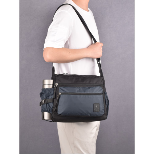 新款男士斜後後背包休閒百搭超輕通勤包牛津布包旅行商務大容量單肩包