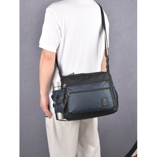 新款男士斜後後背包休閒百搭超輕通勤包牛津布包旅行商務大容量單肩包