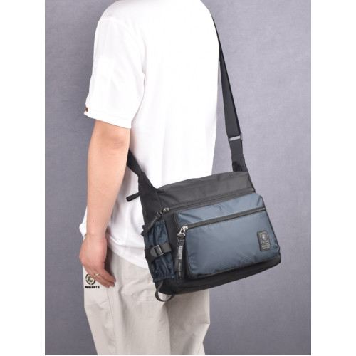 新款男士斜後後背包休閒百搭超輕通勤包牛津布包旅行商務大容量單肩包