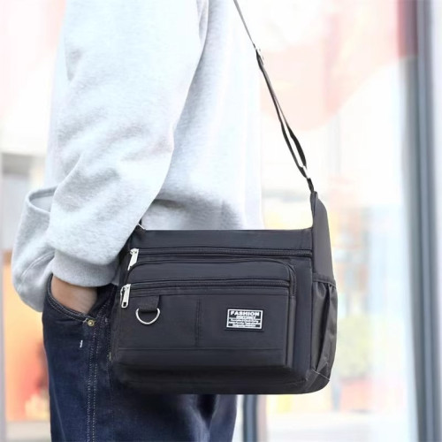 新款男包大容量商務休閒男士單肩斜後後背包防水耐磨多口袋做生意後後背包