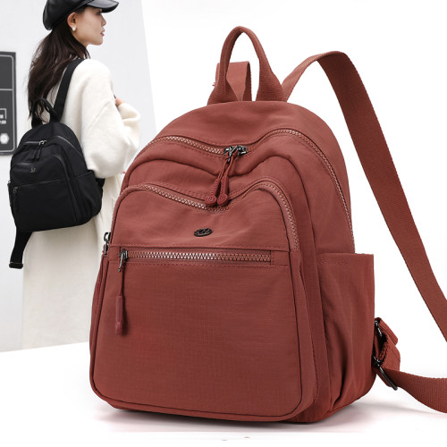 牛津布雙肩包女2025新款時尚輕便小型高級感旅遊帆布休閒後後背包