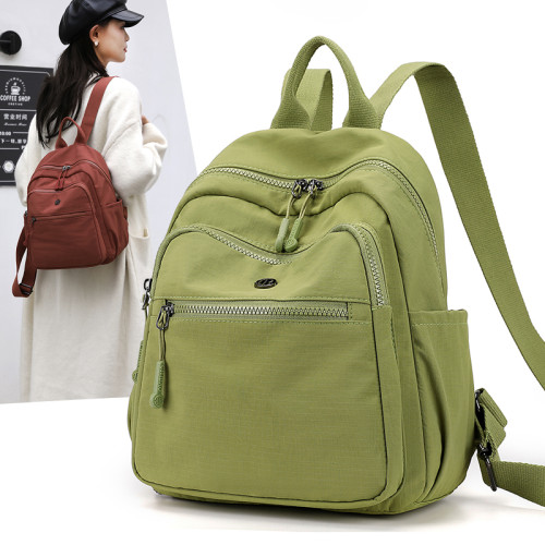 牛津布雙肩包女2025新款時尚輕便小型高級感旅遊帆布休閒後後背包