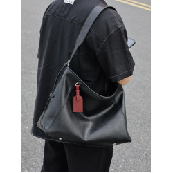 左千戶包2026新款爆款黑武士牛皮斜後後背包男包大容量通勤包電腦包