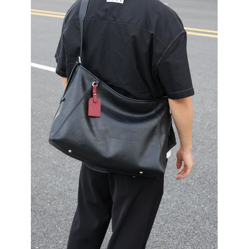 左千戶包2026新款爆款黑武士牛皮斜後後背包男包大容量通勤包電腦包