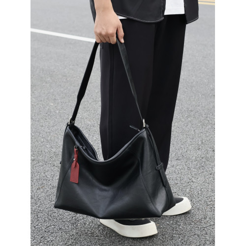 左千戶包2026新款爆款黑武士牛皮斜後後背包男包大容量通勤包電腦包