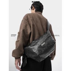 綁結式肩帶爆裂紋2025年新款復古小斜背褶皺餃子包小衆男女款軟包