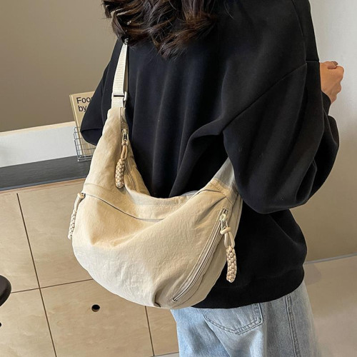 日本純色餃子包斜後後背包2026新款包包休閒運動大容量單肩時尚通勤包 日本純色餃子包斜後後背包2026新款包包休閒運動大容量單肩時尚通勤包