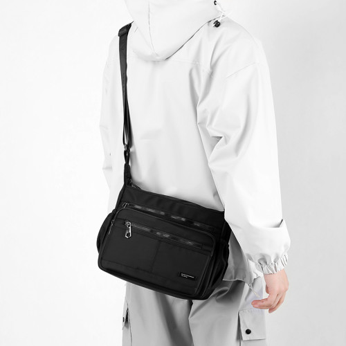 斜後後背包男新款牛津布商務單肩包簡約男士公文包休閒大容量通勤男包