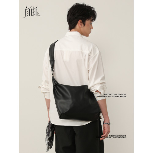 是自由啊 慵懶設計感男女包斜後後背包2026新款簡約休閒大容量餃子包