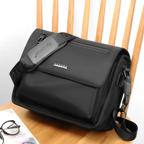 原創男包休閒斜後後背包小型包防水牛津布郵差包新帆布運動後後背包單肩包