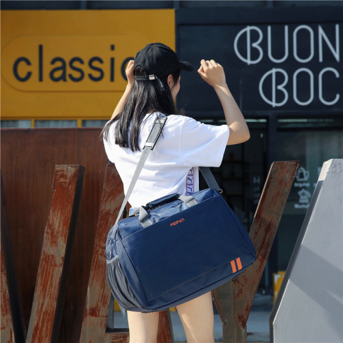 韓版大容量旅行袋手提旅行包可裝衣服的包包行李包女防水旅遊包男