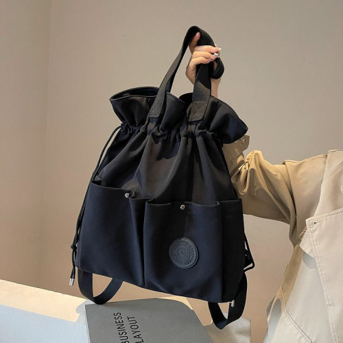 新款時尚輕便雙肩包女新款抽繩旅行包學生書包高級感休閒單肩後後背包